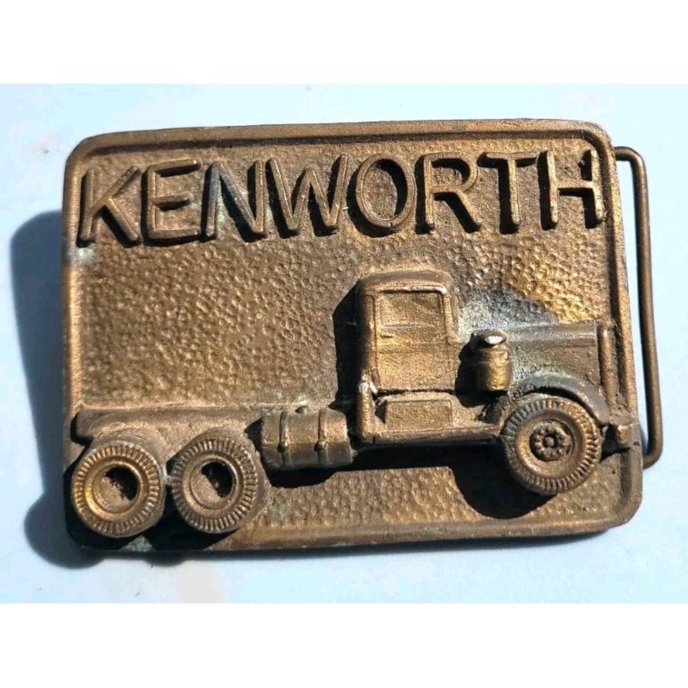 1975 Heavy Solid Brass Kenworth Belt Buckle 1/2 Pound. Nice Patina Rare